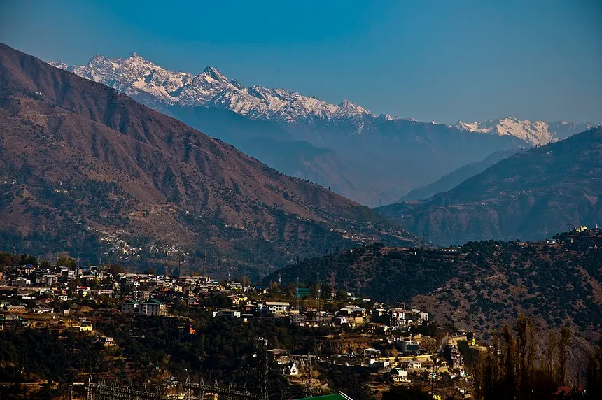 Doda township and terraces backed by majestic snow-capped Himalayan peaks
