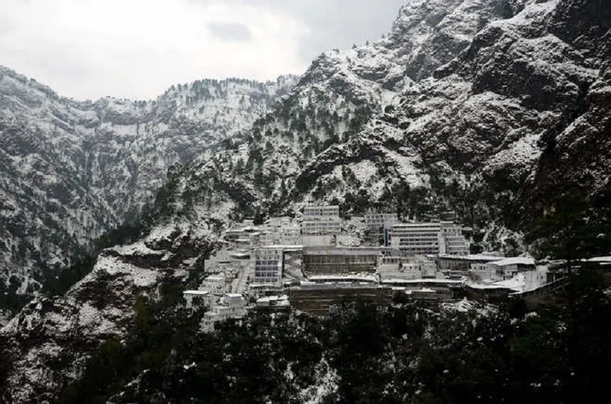 Vaishno Devi Bhawan surrounded by snow covered Trikuta mountain cliffs