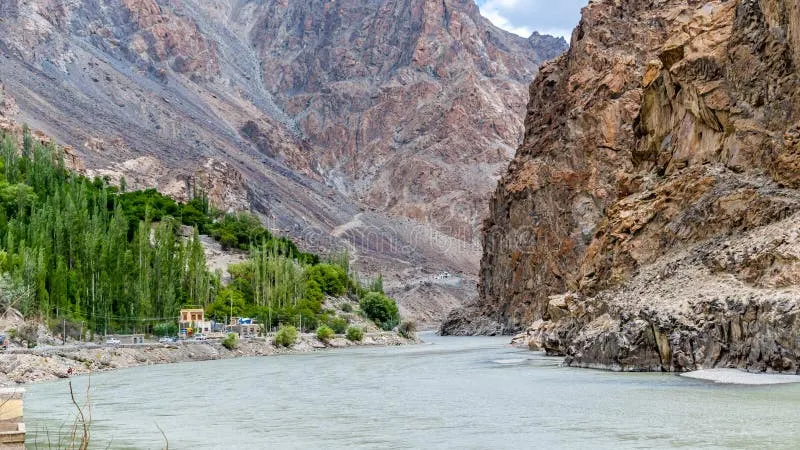 Turquoise Indus river carving through towering sheer rock gorge near Batalik Kargil LoC