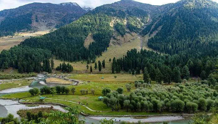 Aerial panorama of Betaab Valley with curving Lidder river and pine slopes
