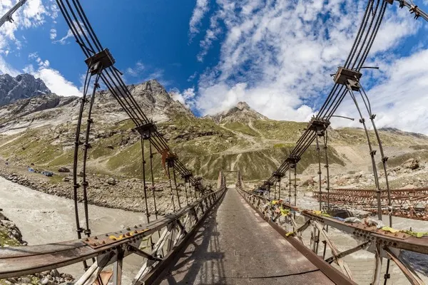 High altitude steel cable suspension bridge in Pir Panjal mountains